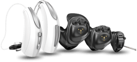 Cinq type d'appareils auditifs l'un à coté de l'autre